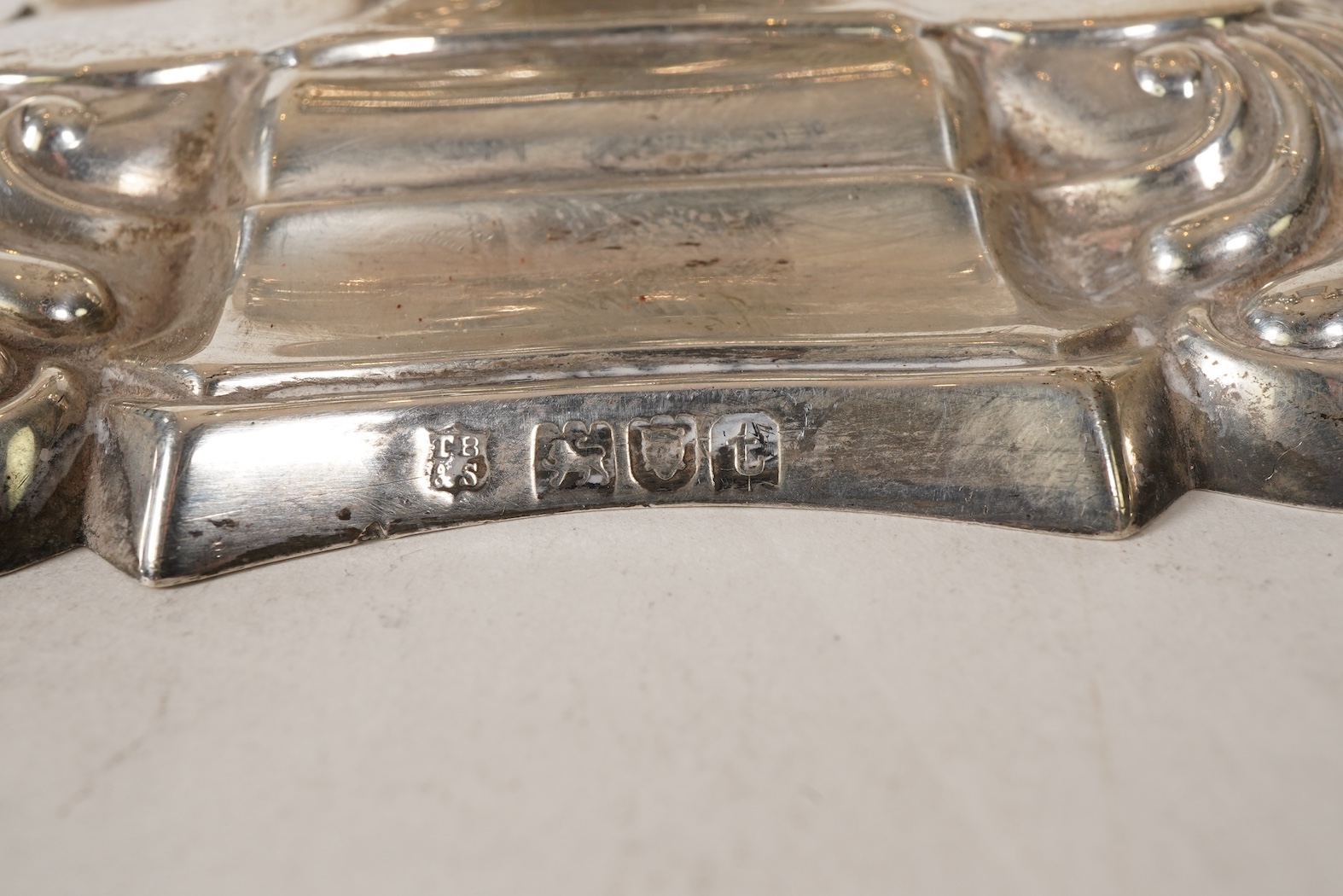 A pair of George V 18th century style silver candlesticks, by Thomas Bradbury & Sons, with removable sconces